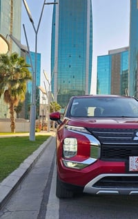 ميتسوبيشي اوتلاندر - موديل 24 وارد امريكي نص مواصفات  ضرر خفيف صور الح...