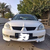 لانسر  2009 رقم بغداد  السياره بسمي تحويل ثاني يوم  السعر ٦٧  وبيها مج...