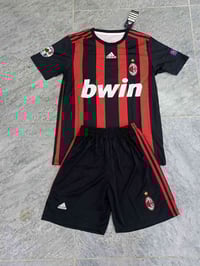 دريس ميلان • مقاسات S-XXL • توصيل العراق