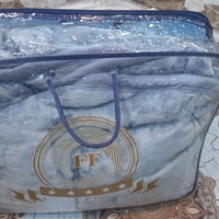 مفروشات فاخرة • بطانيات مبطنة بفرو • دوشك نفرين