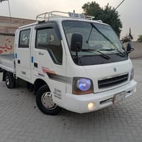 كيا ام عيون موديل 2002 ،،،،رقم بغداد الماني سنويه29 تحويل ثاني يوم/مكي...