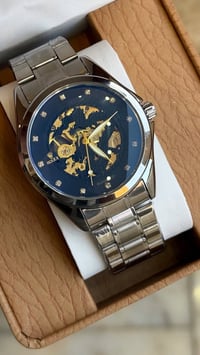 ساعة اوتوماتيك • حركة اليد