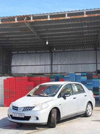 تيدا • ٢٠٠٩ • اوتوماتيك