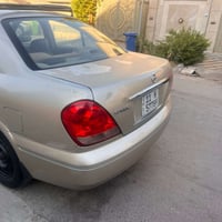 نيسان سني ياباني ٢٠٠٩ بيها كم قطعه صبغ وبيها جراد بنيد وصندوك سياره جا...