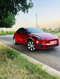 تيسلا موديل y/2023 لونك رينج دبل ماطور رقم بغداد باسمي تحويل مباشر  مش...
