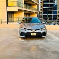 كامري ٢٠٢٣ le هايبرد بدون ايرباك رقم بغداد الجديد ماشيه ٢٨ الف ميل  مو...