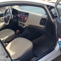 كيه ريو موديل 2012 خليجي مكينه 1600 كير نضيفه حداديه نص عمر رقم بغداد ...