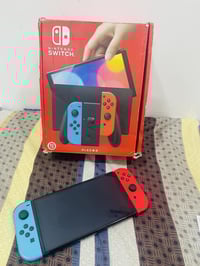 نينتندو سويتش OLED • حالة ٩٠-١٠٠ • كامل ملحقاته