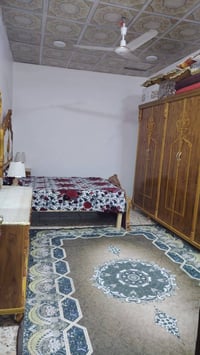 خلف الملعب • ١٥٠م • ٢غرف