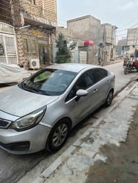 كيا ريو موديل 2012 مكفوله من الضربه والصبغ والتبديل كير ومكينه شرط سون...