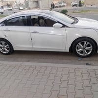 سوناتا 2011 لون ابيض صدفي كير محرك 2400 كفاله  بيها صبغ بالچاملق والهل...
