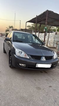 شباب  لانسر موديل 2006 سياره كامله و جديده  مصبوغه عام جماليه  رقم بغد...