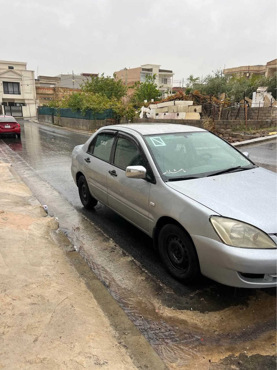 سياره لانسر ميتسيبوشي موديل ٢٠٠٧  كير توماتيك مه كينه كه وره ٤بارجه ي به خه بي ليدان سنوي تازه به سه رجوه ٥ ورقه غرامه ي له سه ره دواي معامله بگيره وه به شه رتي كيرو مكينه و ته بريدو هه موشتي سعري ٦٨ گلاو توزيك مجال شوين ئاكري *********** دهوك, العراق
