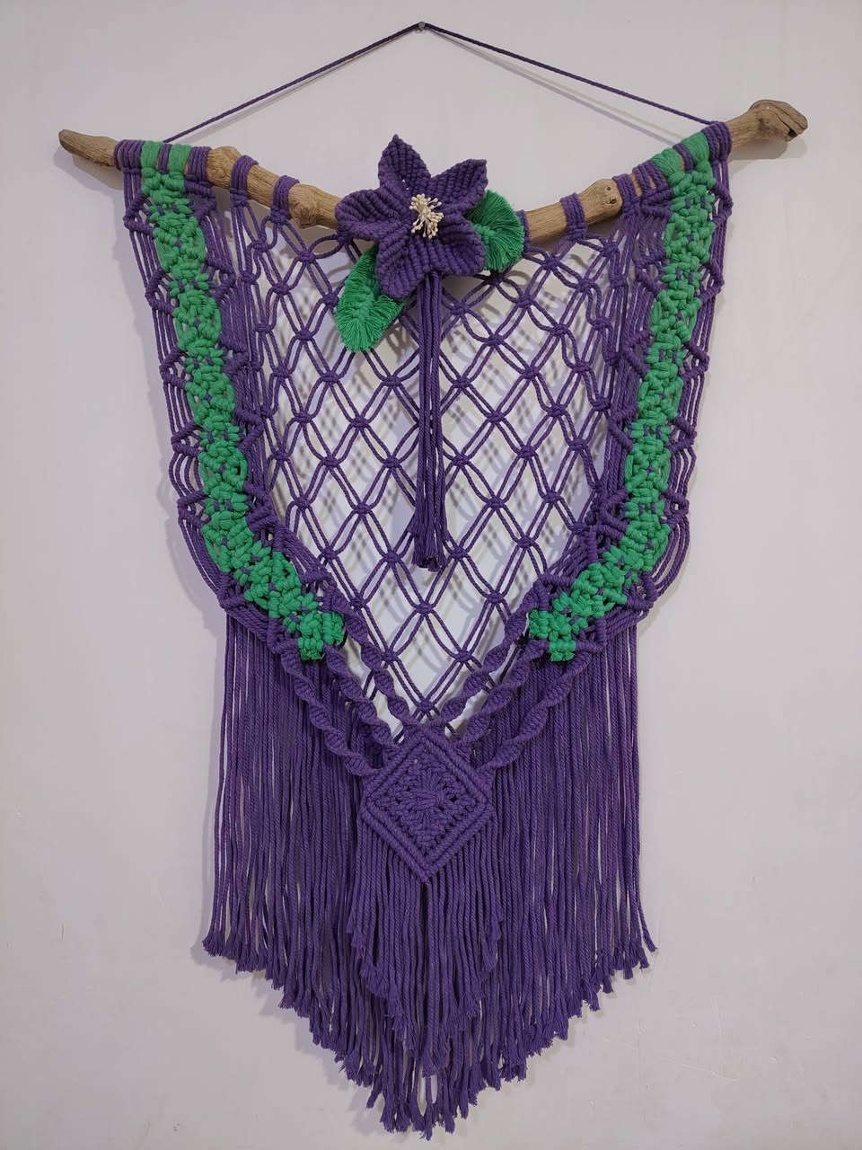 قطعة فنية مصنوعة يدويًا بعناية وجودة عالية، تضيف الدفء والشخصية لأي مكان.
تجمع بين اللونين الأرجواني والأخضر بتناسق جميل، وتتميز بعقد المكرمية المعقدة والزهرة البارزة على قطعة خشبية طبيعية.
مصنوعة من خيوط المكرمية القطنية عالية الجودة.
مثالية لتعليقها في غرفة المعيشة، غرفة النوم، أو حتى في الأماكن التجارية والمناسبات الخاصة.
وهي خيار رائع كهدية مميزة وفريد للأصدقاء والعائلة.
تتوفر بقطعة واحدة مميزة،
 للطلب والتواصل ***********
A meticulously handcrafted piece of art, this high-quality ornament adds warmth and personality to any space.

Beautifully blending purple and green, it features intricate macrame knots and a raised flower on a natural wood base.

Made from high-quality cotton macrame cord.

Perfect for hanging in the living room, bedroom, or even in commercial spaces and for special occasions.

It makes a wonderful and unique gift for friends and family.

Available as a single, distinctive piece.

To order, please contact ***********
#art #fyp #handmade #makrome #iraq #baghdad #erbil
