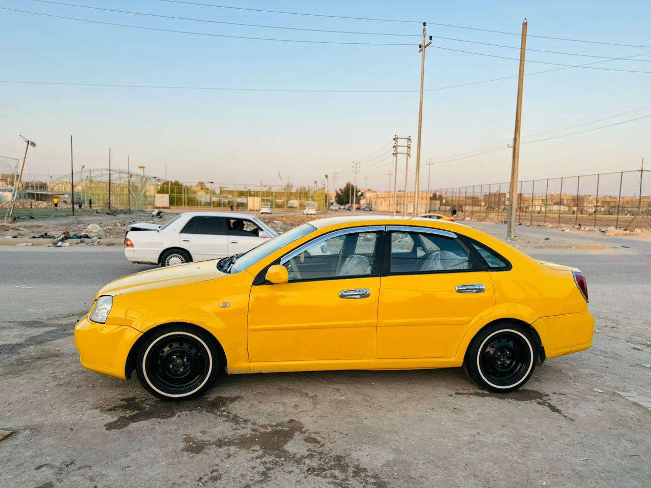 سلام عليكم سياره دايوو برستي هيه غرامات  مصفره حداديه تخم تاير كامله وكاله عامه بسمي رقم مميز السعى 50 وبيها مجال مكاني ناصريه مركز ***********
