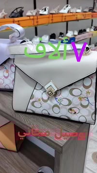 الكوت • توصيل مجاني • أحذية وحقائب