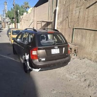 كيا راندو ٢٠٠٩ وارد امريكي بدون حادث  محرك ٢٠٠٠ ٤سلندر  تبريد قطعتين  ...