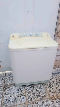 غسالة ملابس • ١٦ كليو • النجف