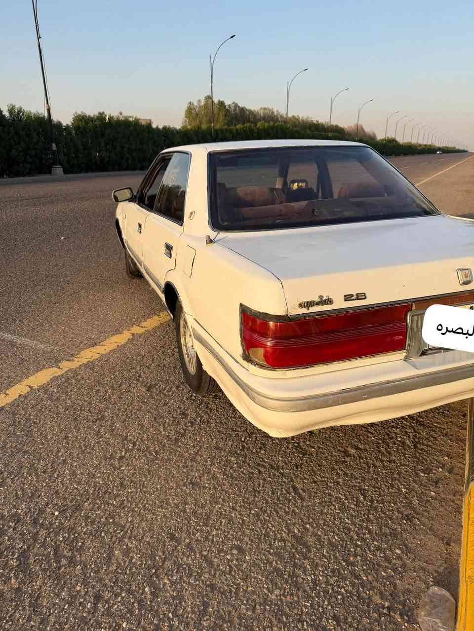السلام وعليكم هارتوب للبيع 89يسره ابلاد رقم ذي قار انكليزي السياره صبغ قليل بيه غرفه نضيفا كير محرك لا تنقيص ولا تبخير محرك2500 تبريد خلفي ثلاجه خلفيه فتحا 
الرقم ***********مكاني بصره
