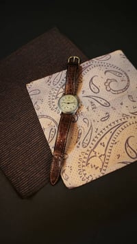 ساعة أولما • ميكانيكية يدويّة • خمسينات/ستينات