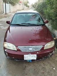 سبكترا • ٢٠٠٢ • أوتو