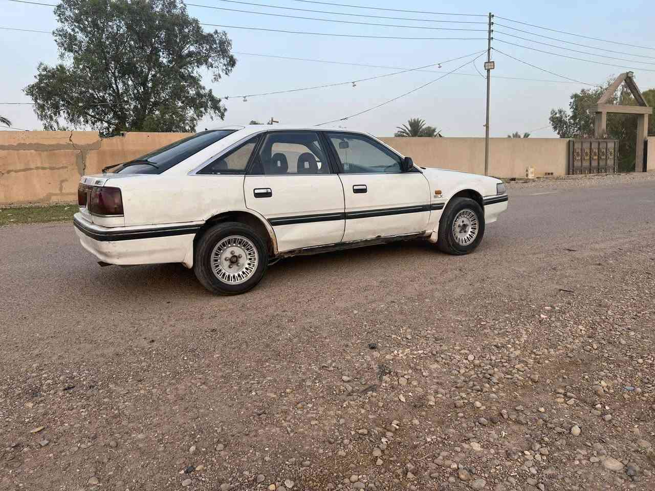 للبيع مازده بغداد رقم نكليزي سنويه لغاية 29 هزه جديده سعر 25$ رقم ‏‪***********‬‏  سياره محرك وكير عادي مكفولات حدادا جيد جداً كهربائيات شغاله ويل كب دواخل نضيفه مكاني بغداد

