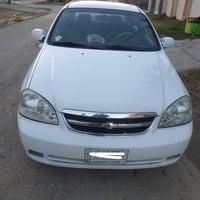 اوبترا موديل ٢٠١٢ رقم بغداد مكفوله السعر ١٠٠  رقم التلفون ٠٧٧١٦٤٩٠٠٥٦