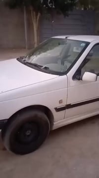 بيجو 405 للبيع مديل 2010 تبريد كهربائيات خير من الله مدور ثاني يوم  مب...