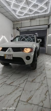 بيكب L200 • ٢٠٠٩ • داخل مدرع