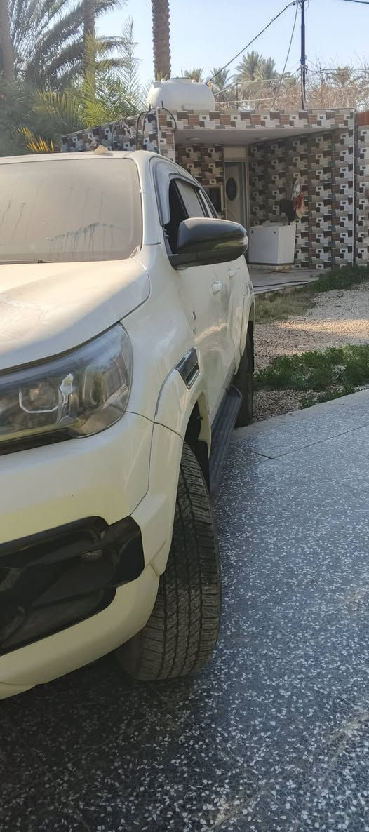 تيوتا هايلوكس2022 GRسعودي مكفوله  فول مواصفات ام المناخ رقم بغداد بسمي ماشيه 90الف السعر410وبيه مجال ***********مكاني بابل
