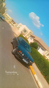 بي ام 740i • زيتوني • مكينة وكير شرط