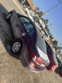 سيارة أجرة • العلم • تكريت