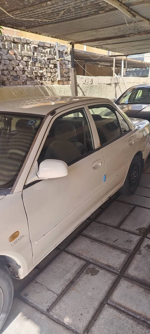 سلام عليكم موديل ٢٠٠٢ بسمي نكليزي هزه جديده بدون ضربه وبدون صبغ تبريد تدفئة شغاله كير  محرك كهرباء مضبوط كامله سياره ناعمه مكاني بالمنصور  رقمي *********** سعر ٤٥ قفل
