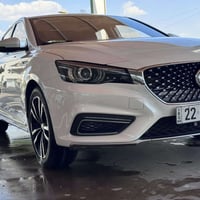 سيارة ام جي 6 لون ابيض موديل 2023 ماشية 64 الف كيلو  فول مواصفات :  دا...