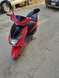 هيوشا رص • سكوتر كهربائي