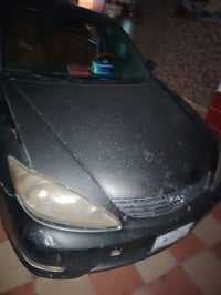 مكلف بالنشر  سيارة كامري موديل 2004  ٤ سلندر  نظيفه بيها شخطه بسيطه با...