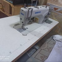 مكينة خياطة • كاتم