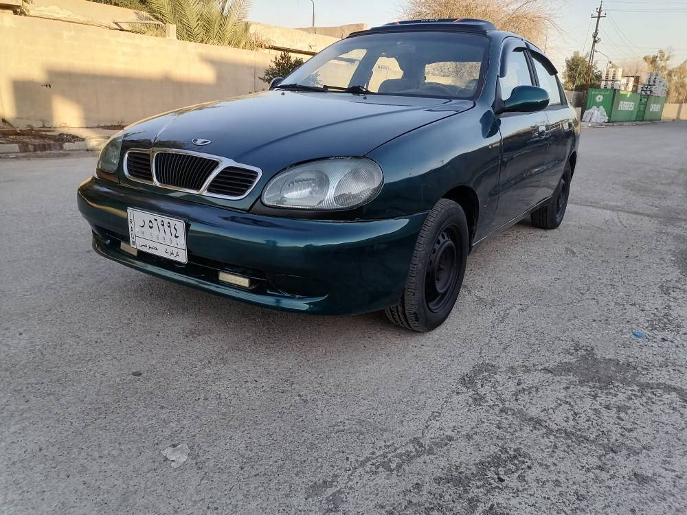 دايو لانوس مشروع وطني شرط تحويل و الوكالة موديل ١٩٩٩ محرك ١٦ فال تفتر بانزين موجود كير محرك صدر شرط صبغ عام جماليه تبريت تدفه كير محرك صدر كهربايات شرط  سعر ٣٦ بي مجال للإستفسار الاتصال زين*********** كورك /*********** بغداد, العراق
