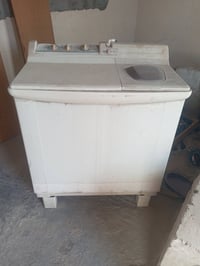 غسالة هيتاشي • ٨ كيلو • تحتاج ماطور تنشيف