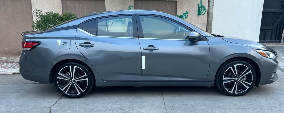 SENTRA 2022 SV 
رقم شانسي: 3N1AB8CV7NY255149 
سياره كه وه ك رسمه كه جوان نه بوو نه ته وي 
رقم و سنه وي ژينگه و هه زه هه مووي تازيه 
بيشو بشتي كبسه بي دعمه به شرت هه تا ئاوي راديته ري شريكه ي تياماوه 
كهرباي هه مووي به شرته رادار و حساس و به ردي اكزوج و هه مووي به شرته.  
ايرباگ به س شاني ته قيوه جي باس نييه.
ليره بينج بارجه ي بوياخه به شرت ئه وه ي نه زاني كامه ي بوياخه يه ك رقمه له گه ل بوياخه بيله دي كه بي معجون بي يه ك قتره ناوه به شرت ١٠٠ سونه ر بي سارده و بي قلم كارت و كارت هه مووي به شرت 
نرخي١٣٧ $ مجالي تيايه 
***********
*********** واتسابي له سه ره كركوك, العراق
