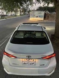 سياره كورلا للبيع  خليجي ٢٠٢١ سياره بيها جاملغ خلفي ونص صندوق ونص داعم...