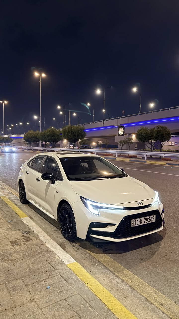 كورلا هايبرد 2025 فئه S بلاك ادشن الفول
ماشية 12 الف كيلو كفالة عامة 

بس بلجنطة بيها بارد اقل الاصبعين 

رقم بغداد الجديد تحويل مباشر

مكان السيارة : بغداد الكاظمية

تواصل : ***********

السعر  : 172$

سيارة بعدها بوضع شركة

كاعيات بعدها بالجيس 

مواصفات ال S معروفة

داخل اسود + محرك 1800 هايبرد HEV 

سياره كت كامل بلاك ادشن بلادي داخل مطعم بكاربون فايبر 

بصمة دخول بصمة ابواب بصمة تشغيل 

ويل كب اسود حجم 17 اسود  

شاشة جبيرة تدعم ابل كار بلي 

 سلايد روف ( فتحة سقف ) دشبول دجتل كامل سايد بريك بصمة اوتو هولد درايف مود وضعيات قيادة ويل جبير حجم … وبعد اهواي مواصفات 

ااسيارة نضيفة كلش واتسعمال فقط للدوام
