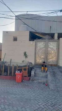 الديوانية حي الشرطه • ١٠٠م • طابق أول كونكريت