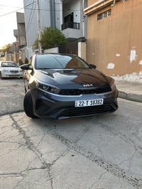 كيا فورتي 2023 محرك 2000 دوش   نص مواصفات   ماشية 31   ضررها نص مكان ا...