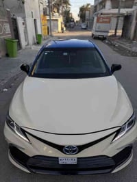 كامري هايبرد تكسي دبي  فئة LEموديل 2023 اصل اصل  الظرر بنيد وجاملغ فقط...