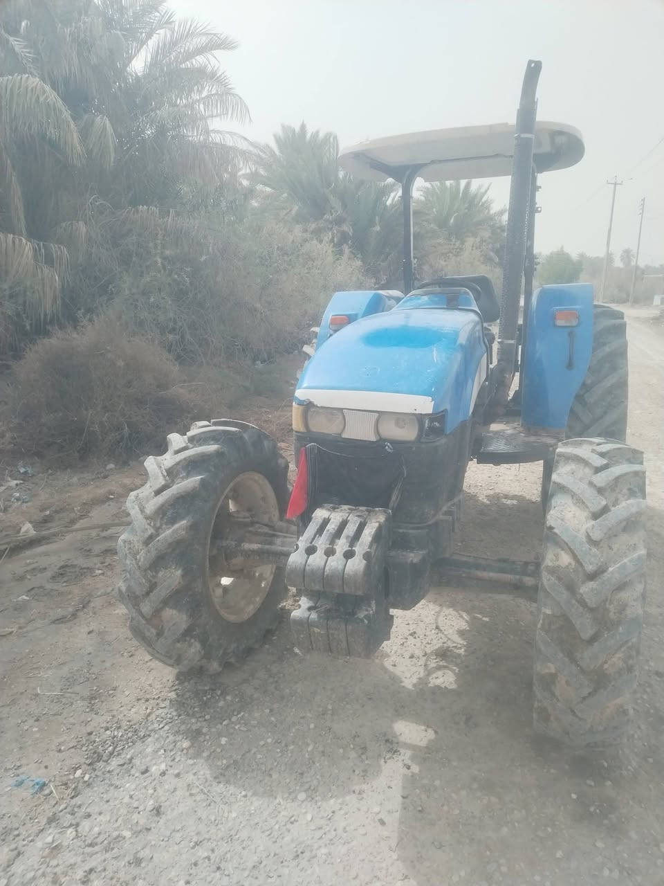 السلام عليكم مكينه نيوهلند مديل ١٢ كتاب شركه تايرات جداد  مكينه وكير جيد وراهه فدان خرماشه رقم الهاتف ***********
