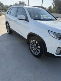 كيا سورنتو للبيع موديل 2014 سيارة جديدة جدآ ماشية 27  الف  حقيقي قمارة...