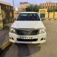 السلام عليكم تيوته هايلوكس موديل 14 كير اوتوماتيك  رقم واسط نكليزي سنو...