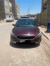 فورتي موديل 2018  لون عنابي نص فول المواصفات   سياره ب اسمي تحويل او و...