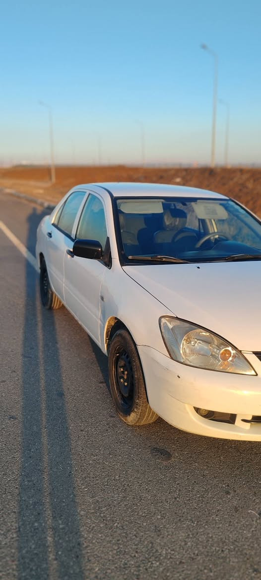 لانسه ر 2010 مه كينه گه وره ى گيرتۆماتیک 4 جام کارەبایی
ئاوينه كاره بايى
گير و مه كينه و ته قه و ره قه و ته بريد و گه رمى هه مووى شتيكى به شه رت. 
پيش و پشت كه پس

چاملخى پشته وه ى بؤياخه بێ ناوەوە
سه نه وى نوێیە
يه ك دينار مه سره فى تيدانييه
*********** أربيل, العراق
